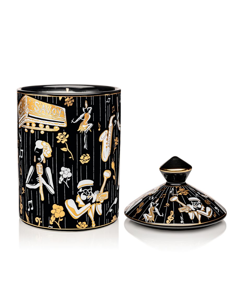 This is an image of our black gold and white Duke, ceramic candle with a lid. It features illustrations of Billie Holiday, the savoy ballroom, Duke Ellington, and other original illustrations.