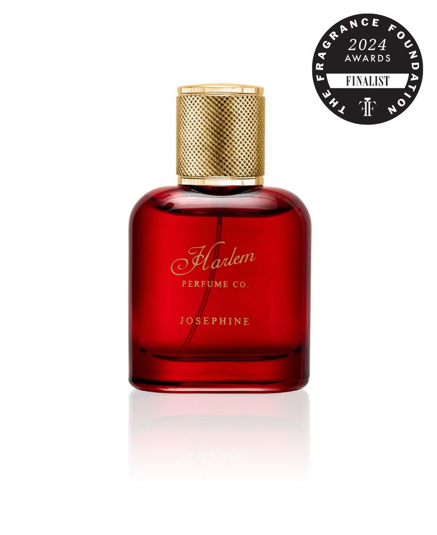 Image of Josephine eau de parfum - in a red translucent bottle with a gold cap.